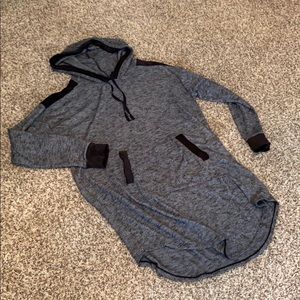 Black tunic with velvet trim.